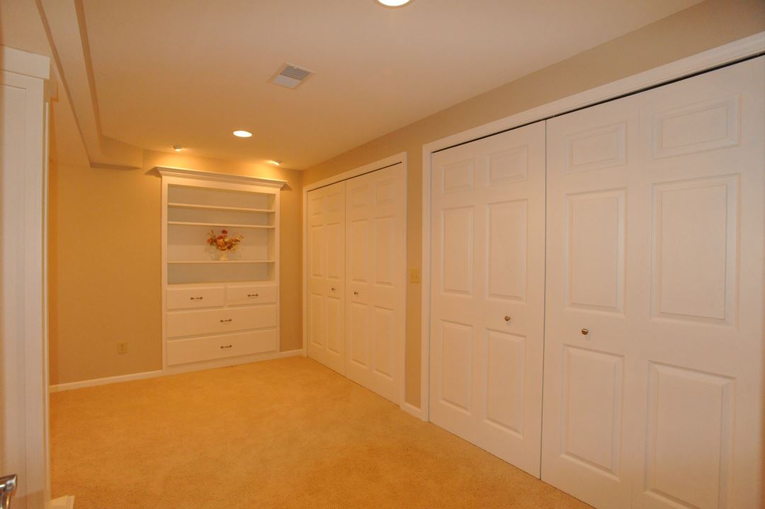 Built in Storage for Basement Renovation Project by Victory Builders